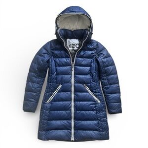 Sleek navy SKEA longline puffer coat with hood — elevated winter staple